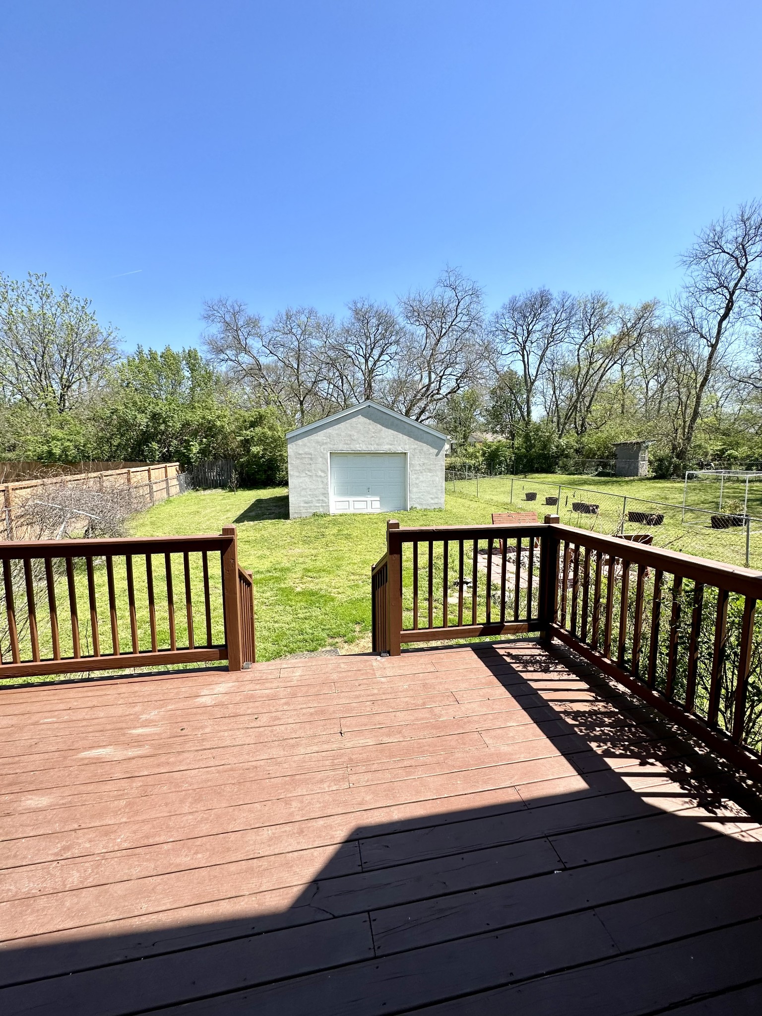 583 Neelys Bend Road Madison, TN 37115 - Photo 19 of 21 a view of a wooden roof deck