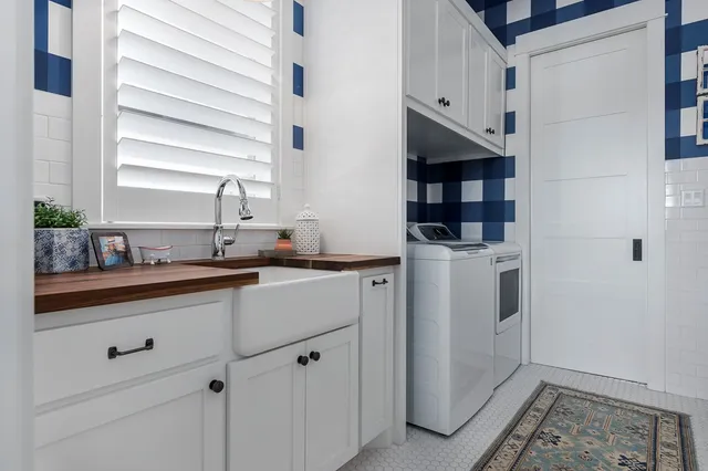 a bathroom with a bathtub and shower