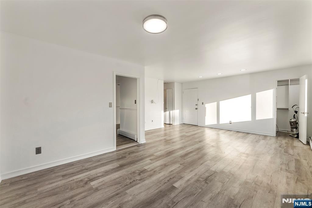 1 Dunn Road West Orange, NJ 07052 - Photo 5 of 20 a view of a room with wooden floor and window