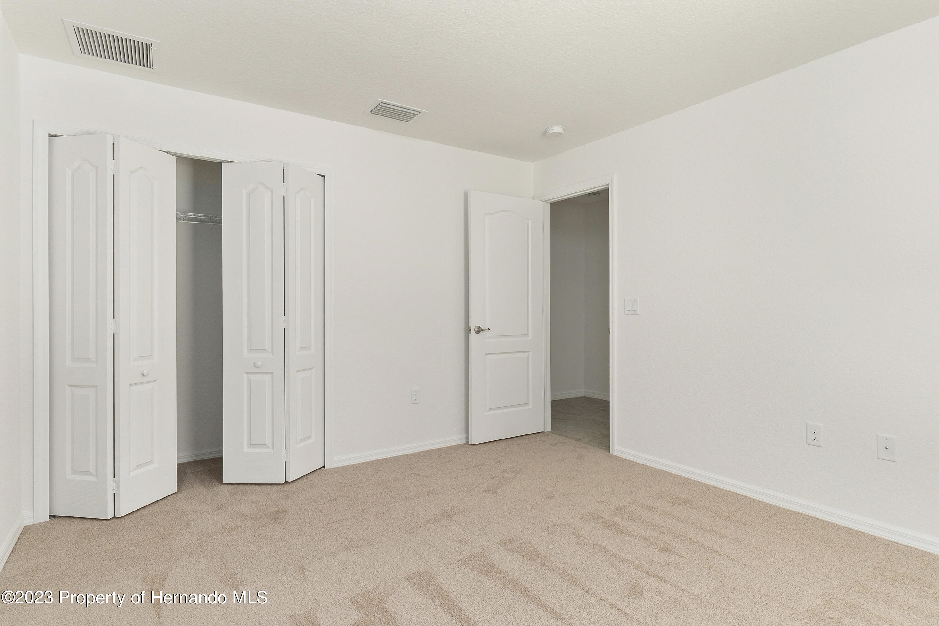 8433 Nightingale Road Weeki Wachee, FL 34613 - Photo 19 of 23 a view of an empty room