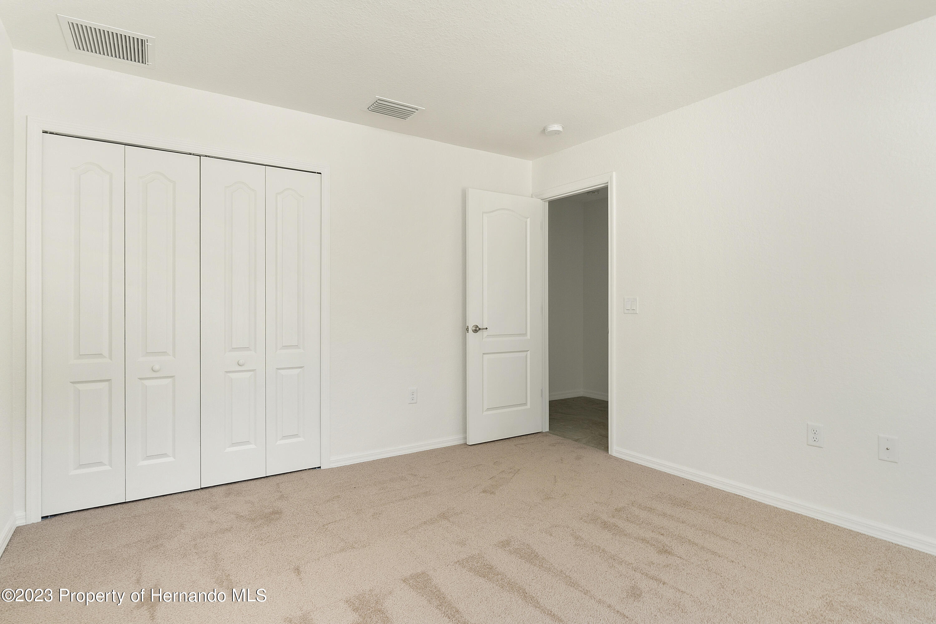 8433 Nightingale Road Weeki Wachee, FL 34613 - Photo 21 of 23 a view of an empty room