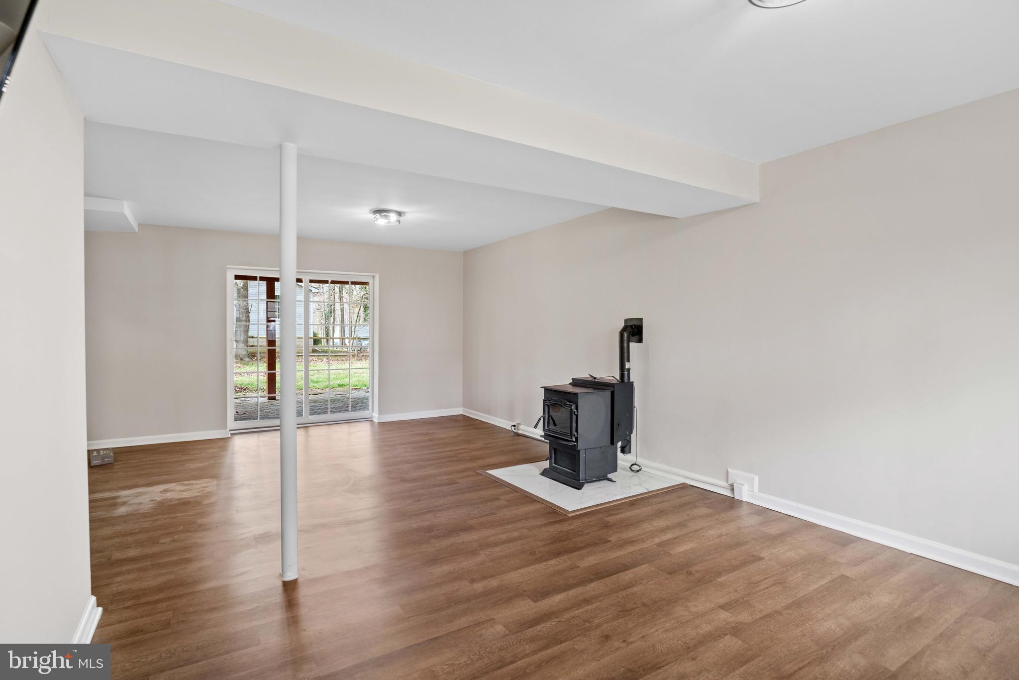 11551 San Rafael Road Lusby, MD 20657 - Photo 24 of 31 a view of a room with a window and wooden floor