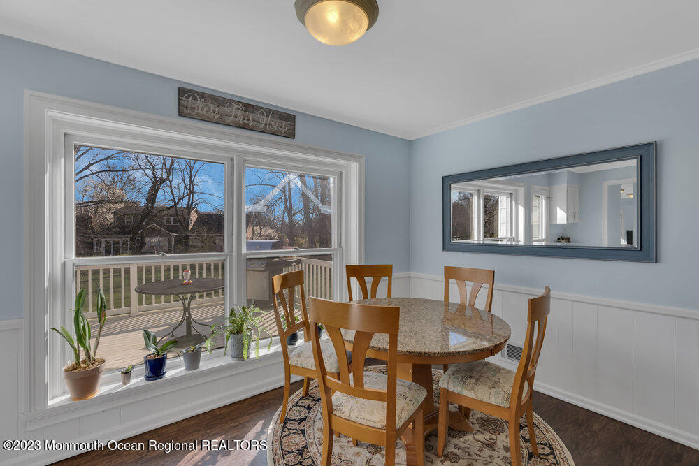 210 Richdale Road Colts Neck, NJ 07722 - Photo 15 of 40 a dining room with furniture a rug and a window