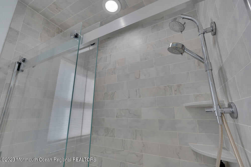 210 Richdale Road Colts Neck, NJ 07722 - Photo 21 of 40 a bathroom with a shower