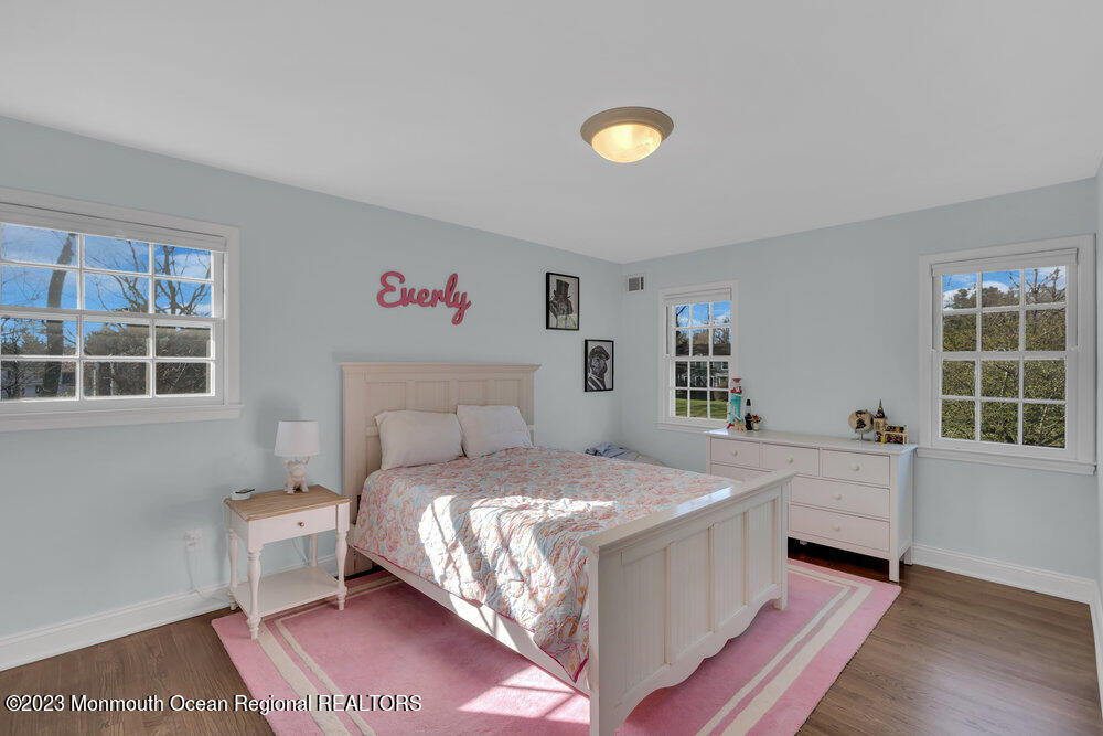 210 Richdale Road Colts Neck, NJ 07722 - Photo 23 of 40 a bedroom with a bed and a window