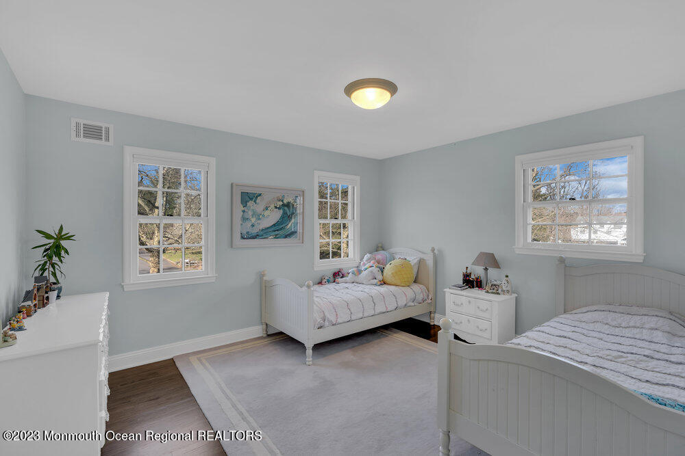 210 Richdale Road Colts Neck, NJ 07722 - Photo 25 of 40 a bedroom with a bed and a window