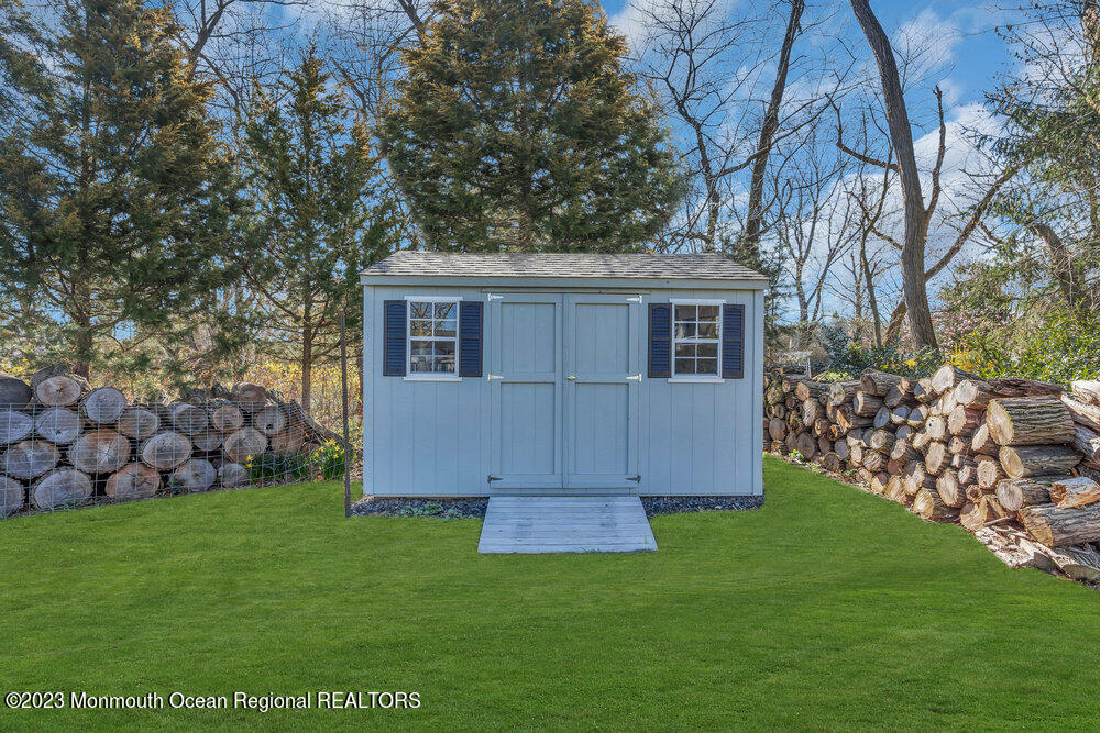 210 Richdale Road Colts Neck, NJ 07722 - Photo 34 of 40 a view of a house with a yard and sitting area