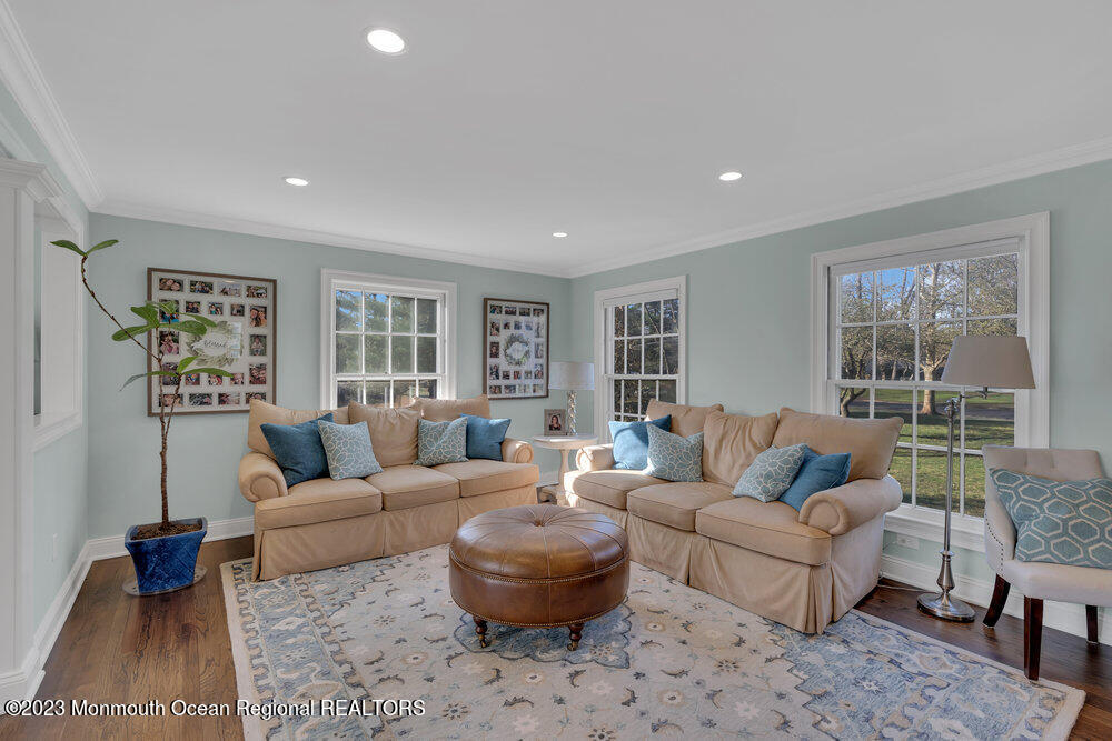 210 Richdale Road Colts Neck, NJ 07722 - Photo 4 of 40 a living room with a couch and a large window
