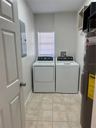 a utility room with dryer and washer
