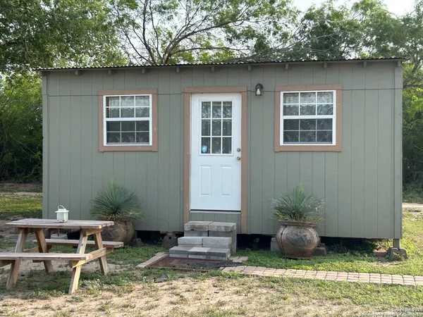 a house view with a outdoor space
