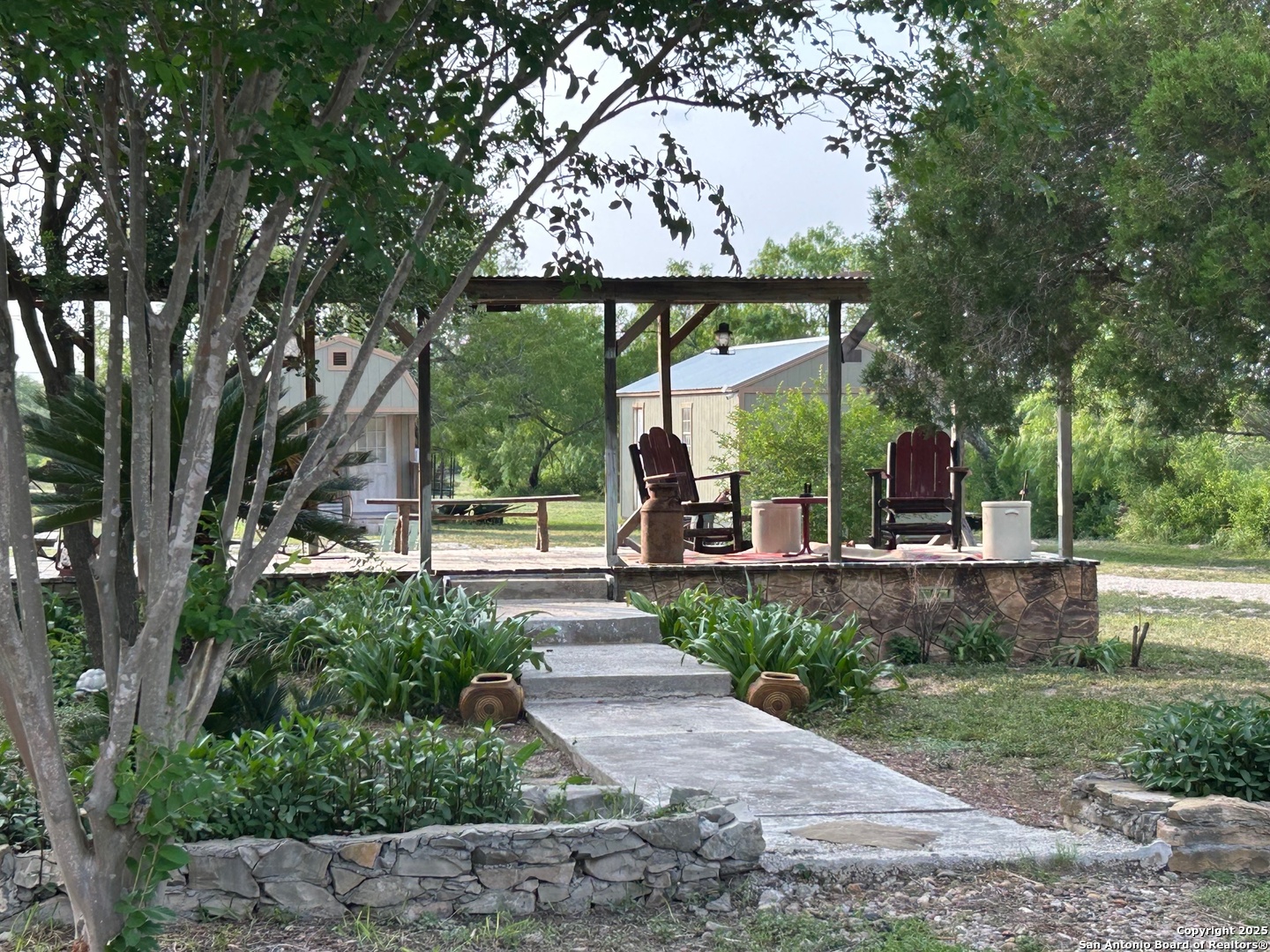 1616 Middle Road George West, TX 78022 - Photo 10 of 14 a front view of a house with a yard