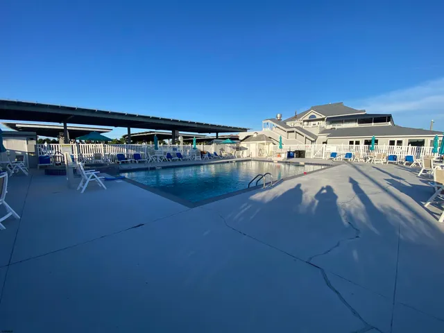 a view of a balcony with chairs