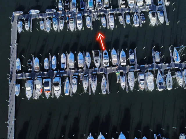 a group of people sitting in front of retail