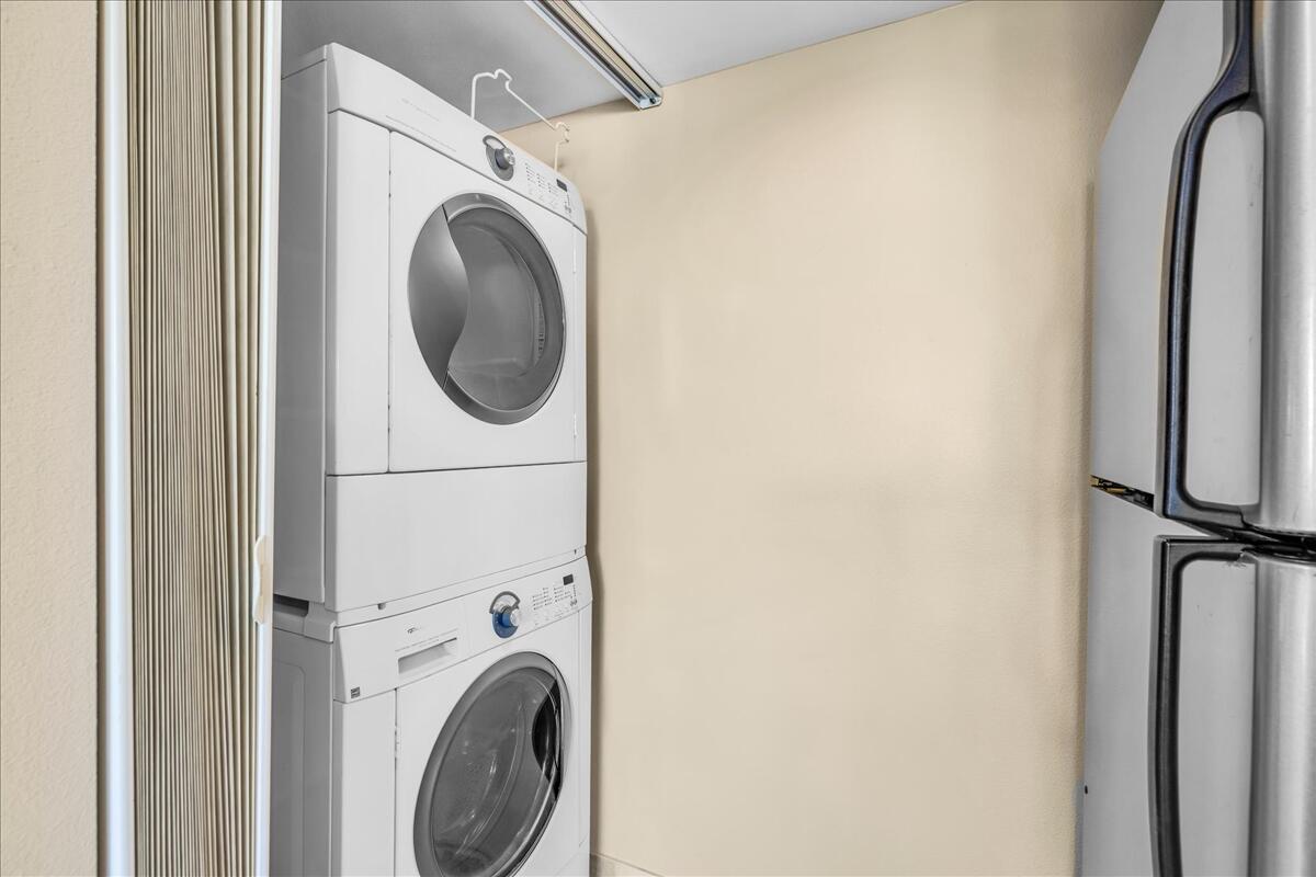 1555 North Chaparral Road, Unit 323 Palm Springs, CA 92262 - Photo 12 of 29 a close view of a utility room with dryer and washer