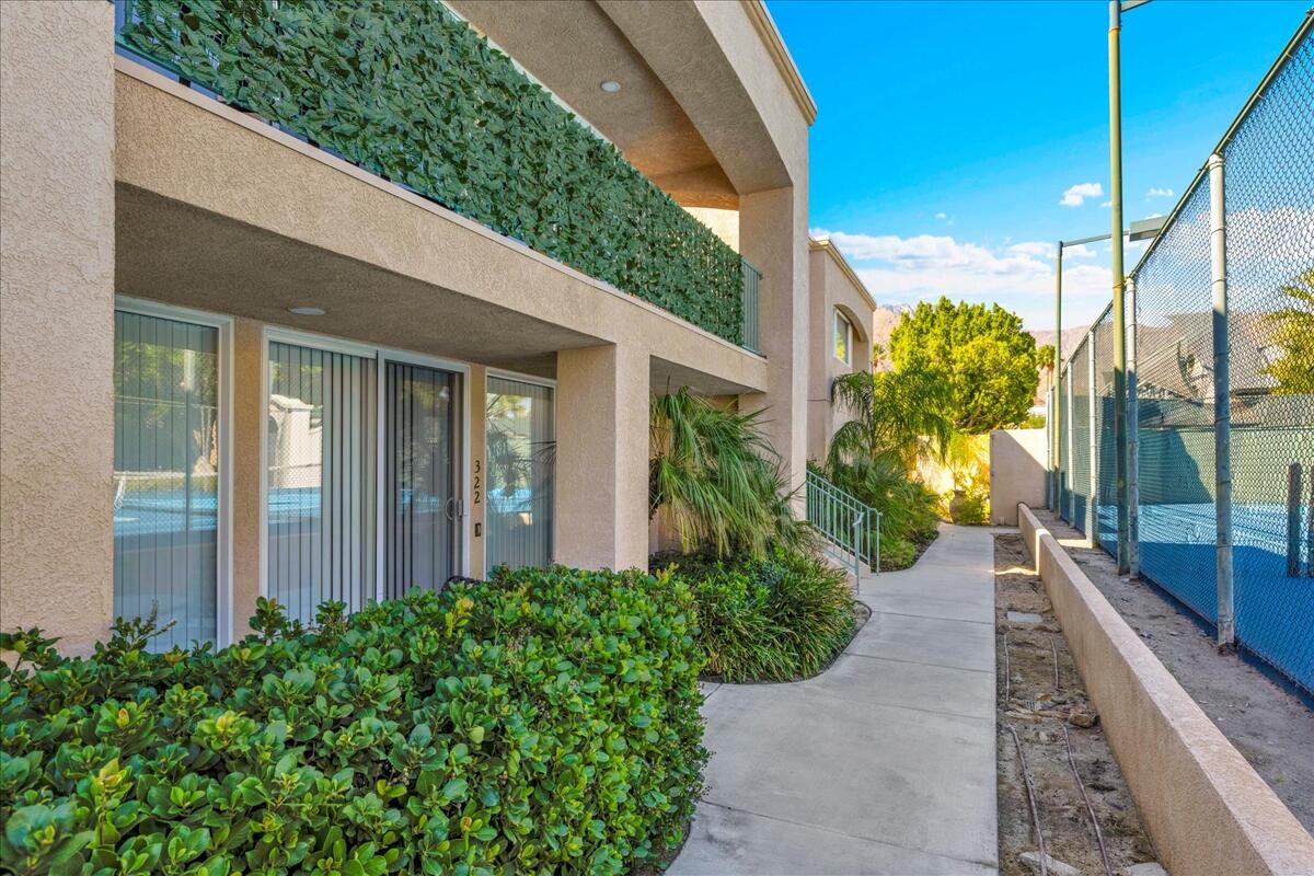 1555 North Chaparral Road, Unit 323 Palm Springs, CA 92262 - Photo 4 of 29 a view of a house with a backyard