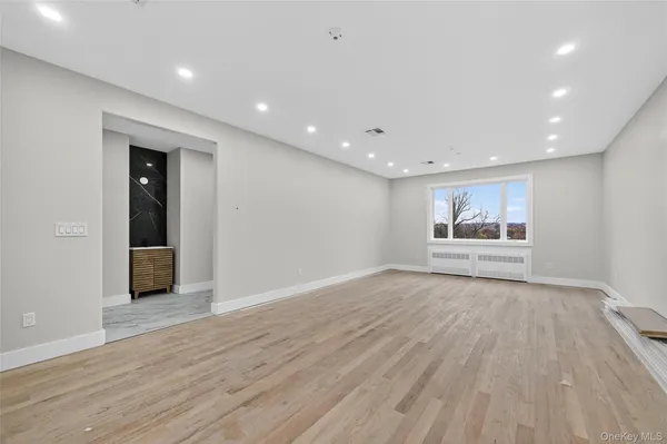 a view of a hallway with entryway