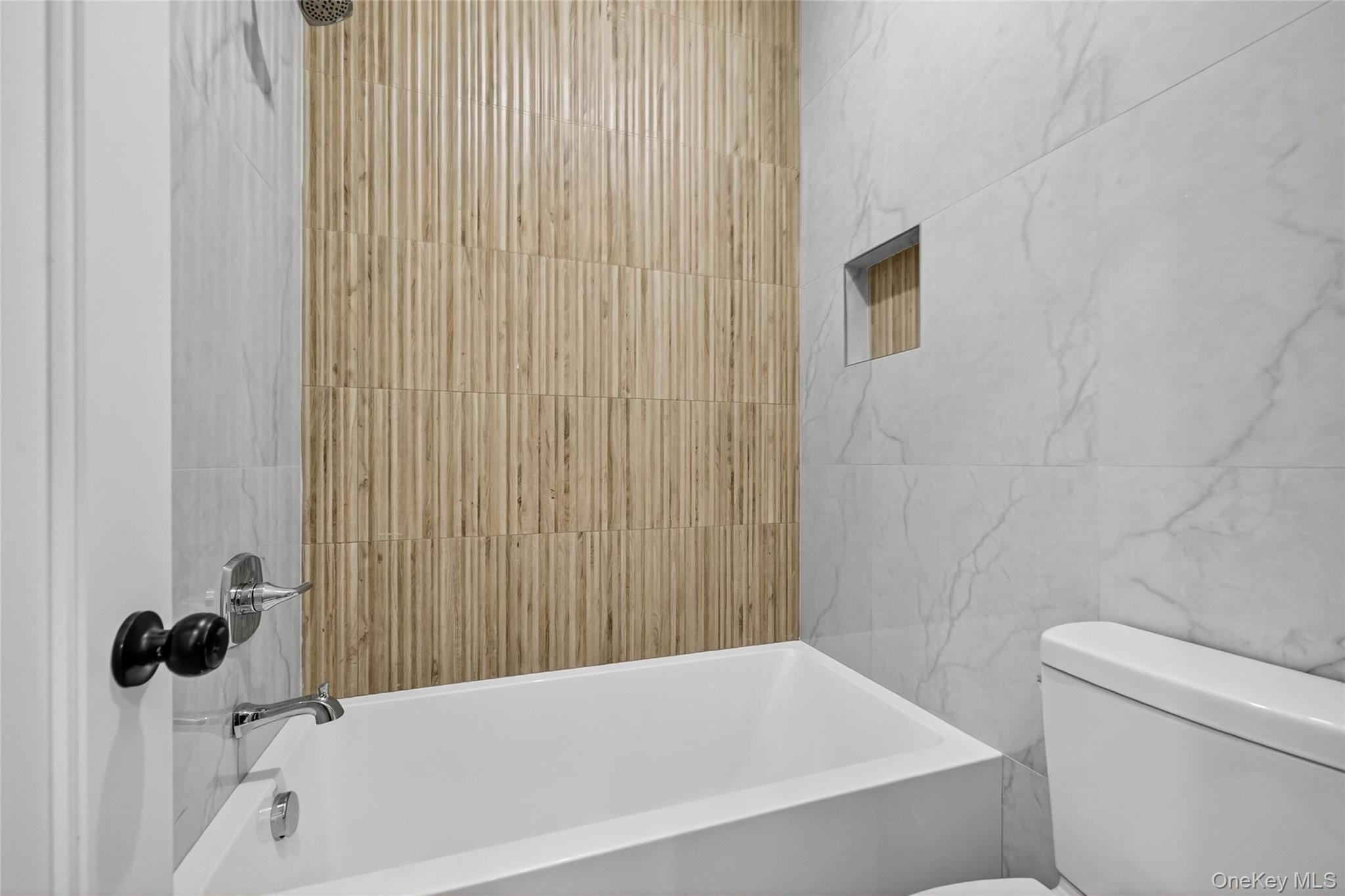 6 Milla Lane Spring Valley, NY 10977 - Photo 22 of 49 a bathroom with a bathtub