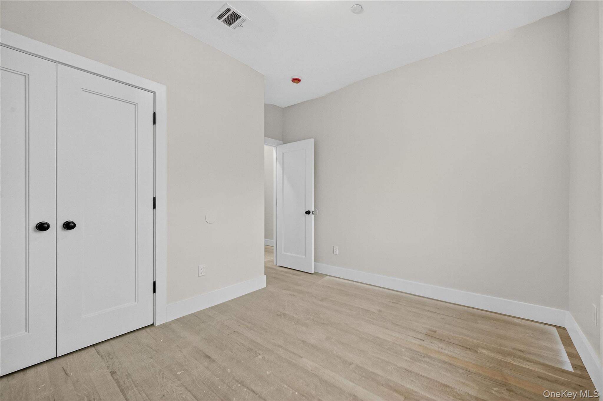 6 Milla Lane Spring Valley, NY 10977 - Photo 27 of 49 a view of an empty room