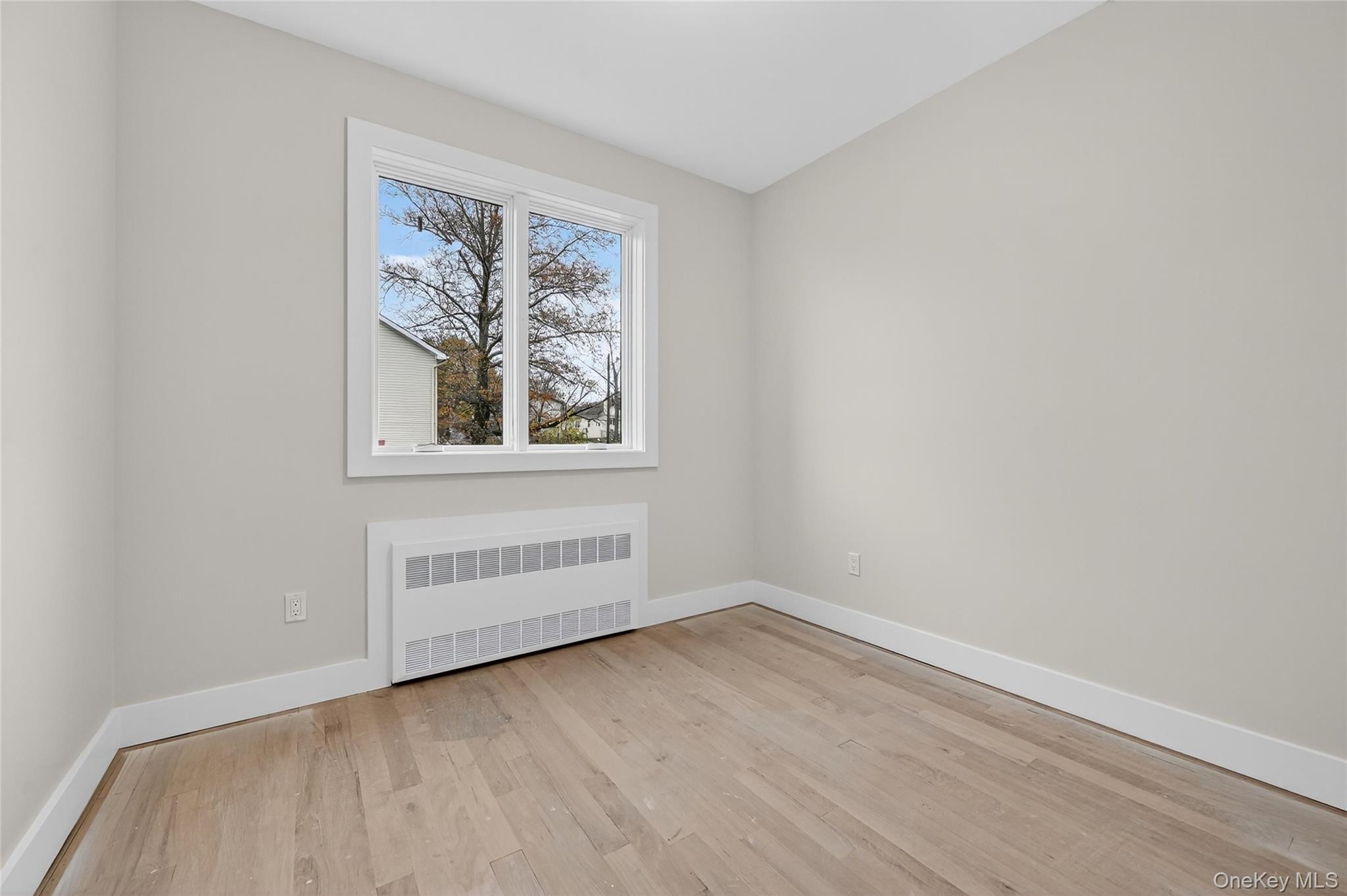 6 Milla Lane Spring Valley, NY 10977 - Photo 30 of 49 an empty room with a window