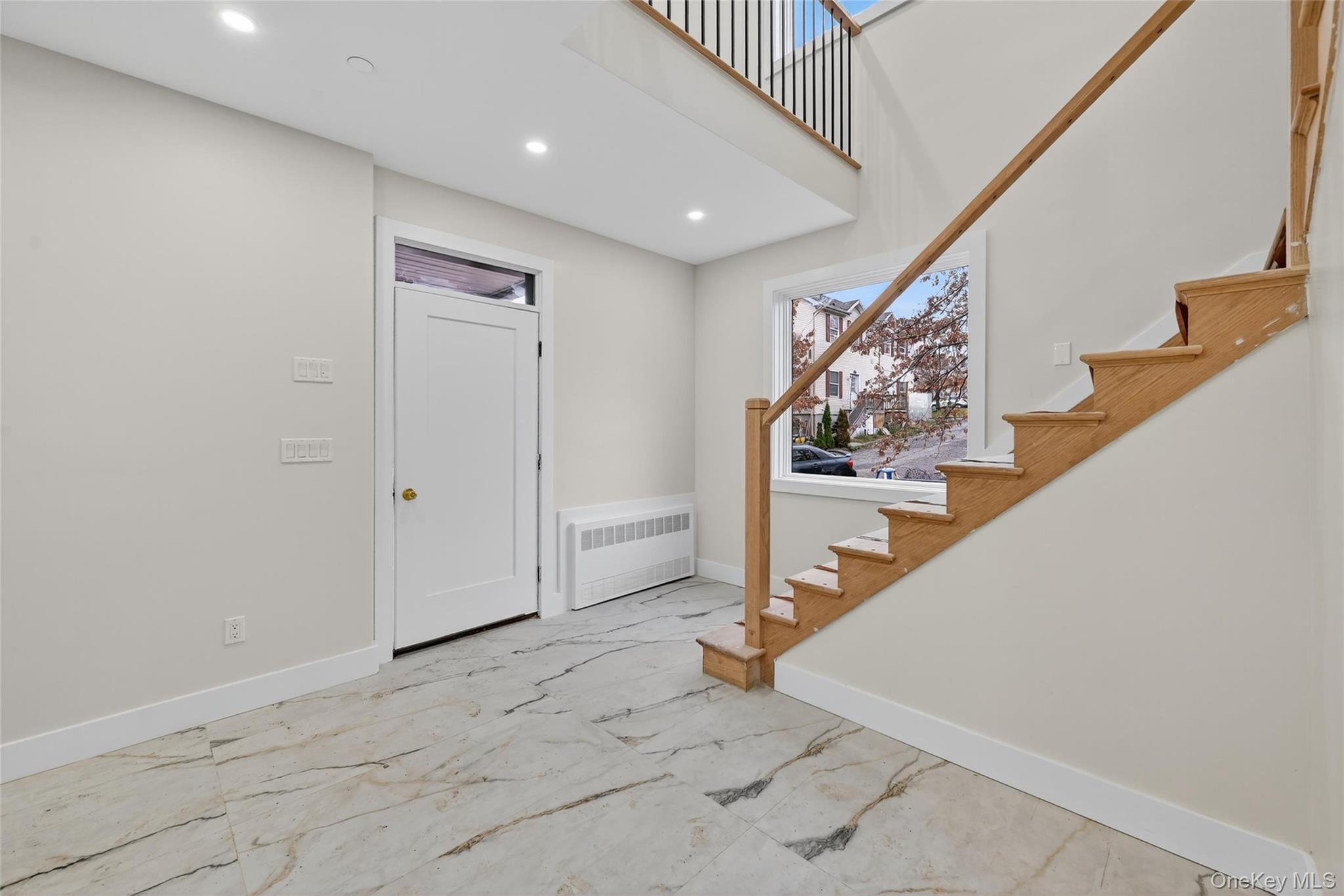 6 Milla Lane Spring Valley, NY 10977 - Photo 4 of 49 a view of a hallway with staircase
