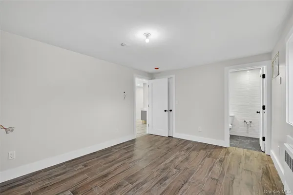 a bathroom with a toilet a sink and bathtub