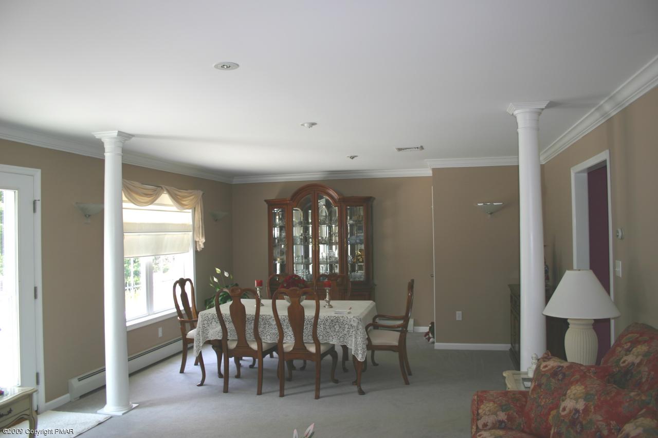 2189 Spruce Cabin Road Cresco, PA 18326 - Photo 9 of 13 a view of a livingroom with furniture and a window
