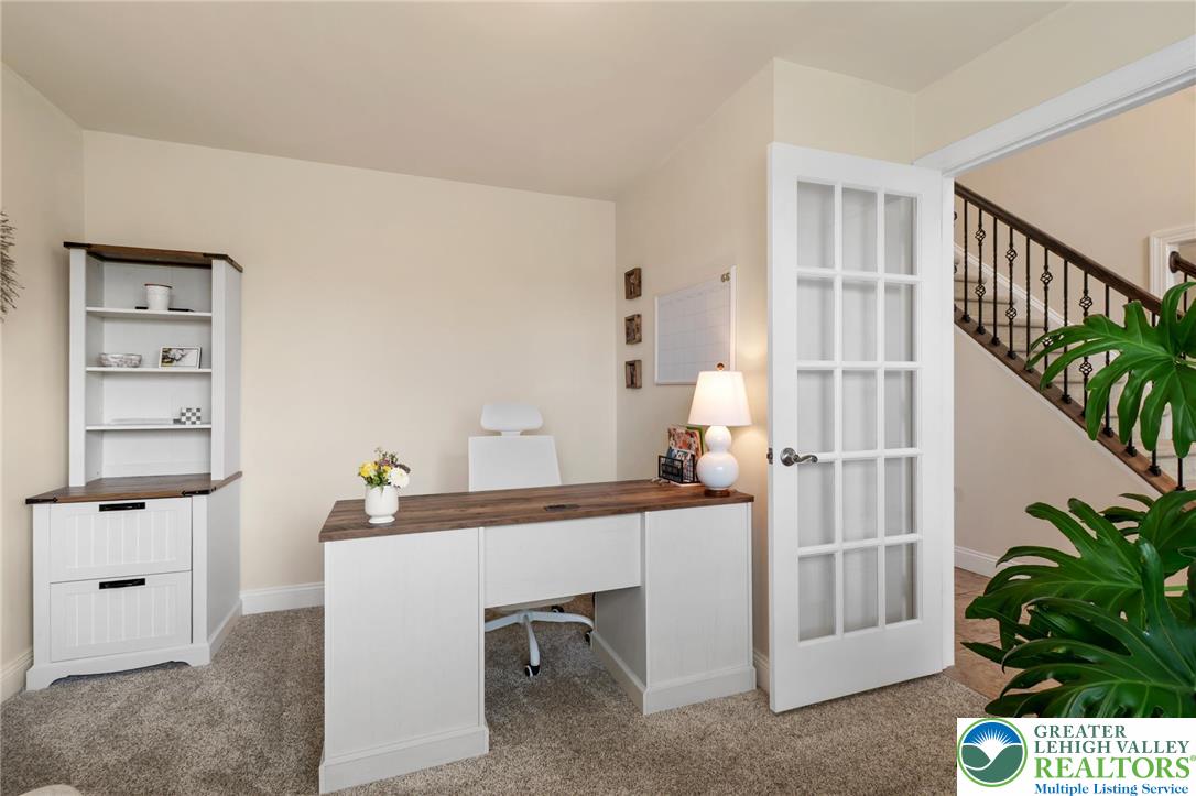 208 East Dell Road Bath, PA 18014 - Photo 17 of 40 a bedroom with furniture and a potted plant