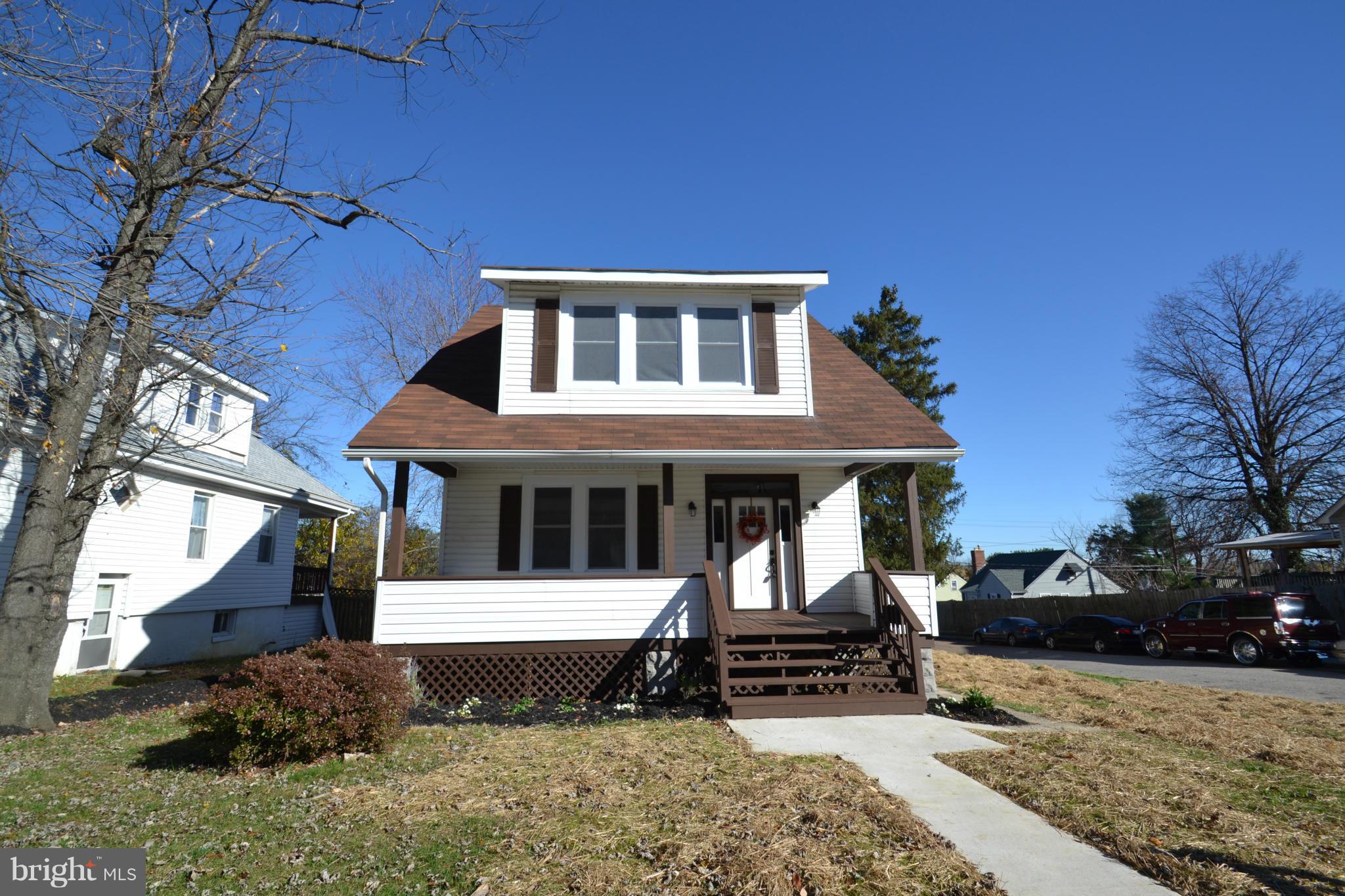 3810 Ridgecroft Road Baltimore, MD 21206 - Photo 1 of 30 a front view of a house with a yard