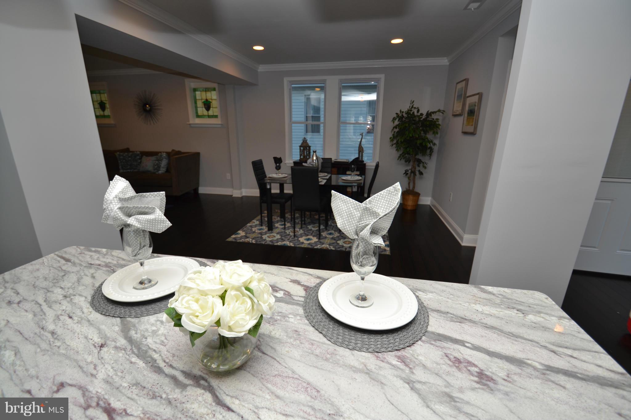 3810 Ridgecroft Road Baltimore, MD 21206 - Photo 12 of 30 a view of a dining room with furniture
