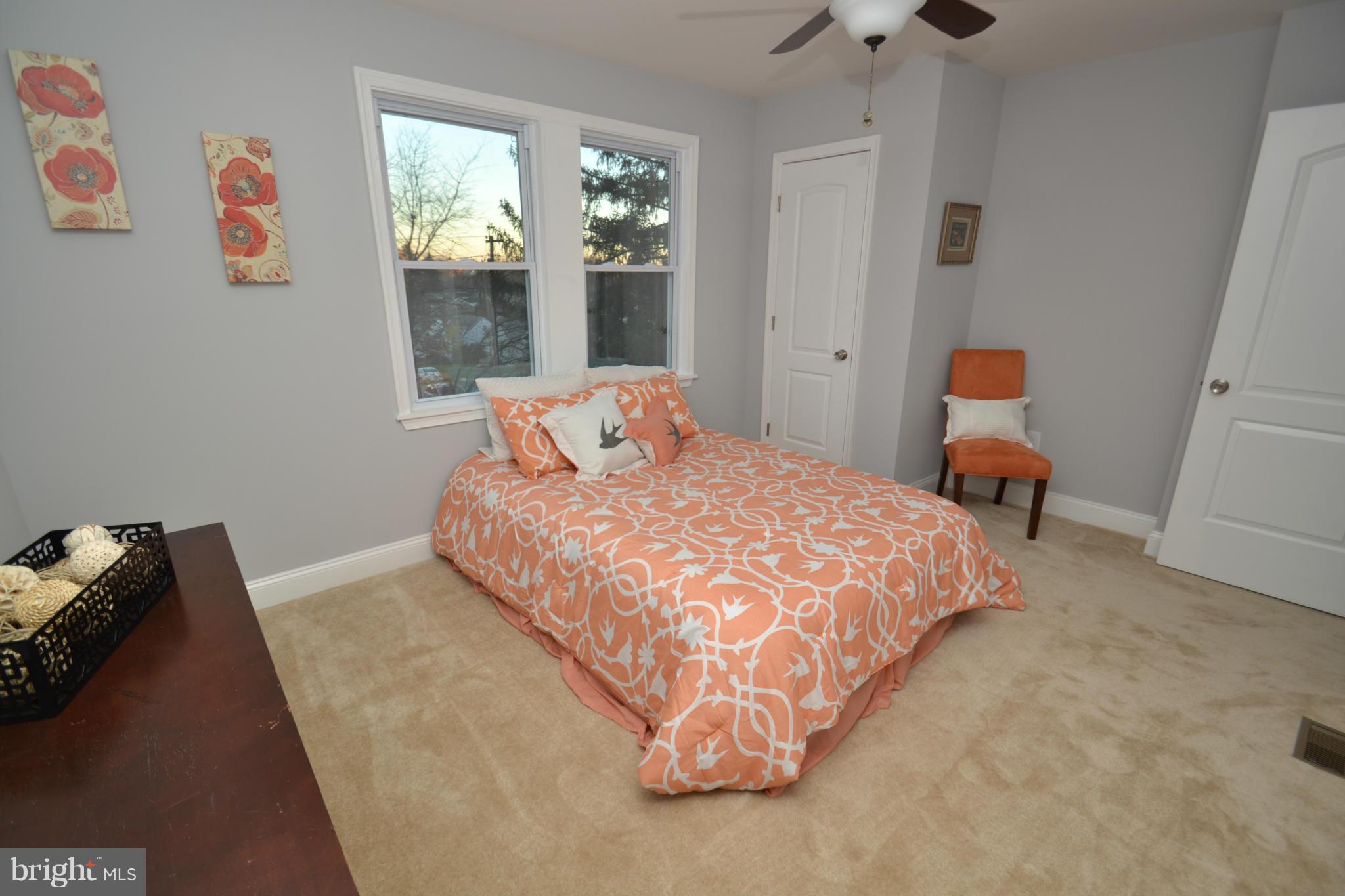 3810 Ridgecroft Road Baltimore, MD 21206 - Photo 16 of 30 a bedroom with a bed and window