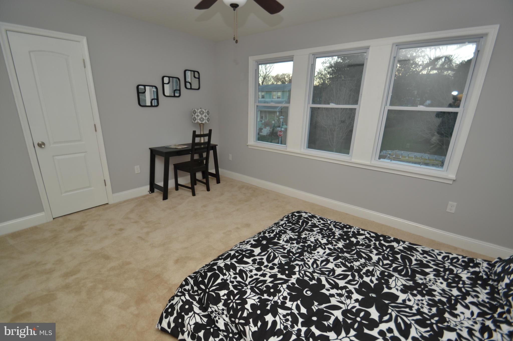 3810 Ridgecroft Road Baltimore, MD 21206 - Photo 20 of 30 a living room with a large window