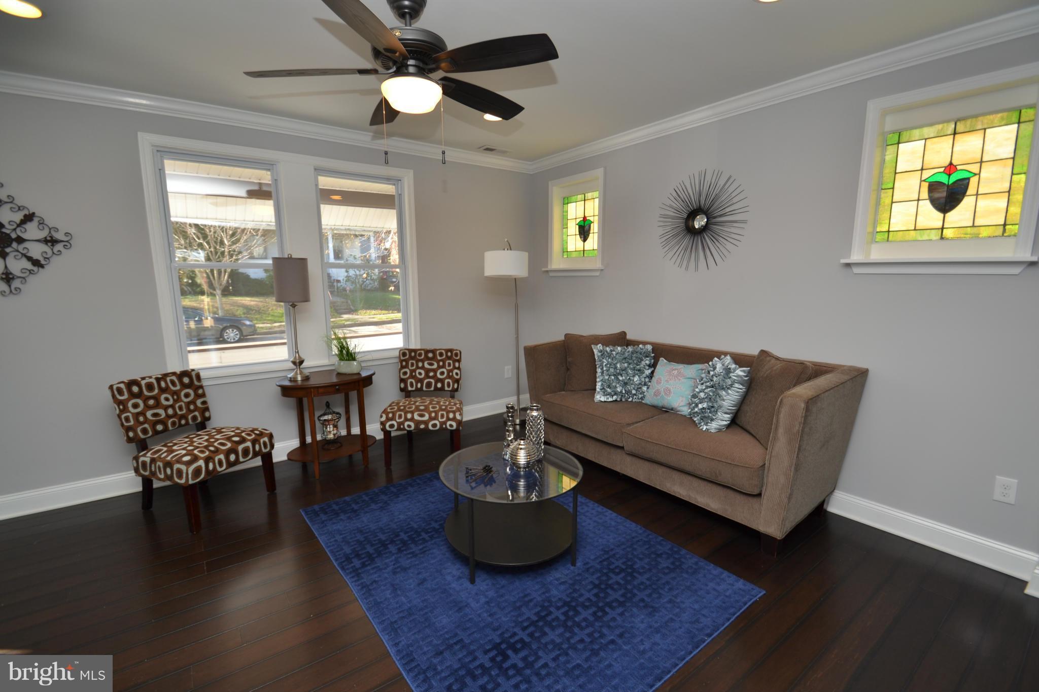 3810 Ridgecroft Road Baltimore, MD 21206 - Photo 4 of 30 a living room with furniture and a large window