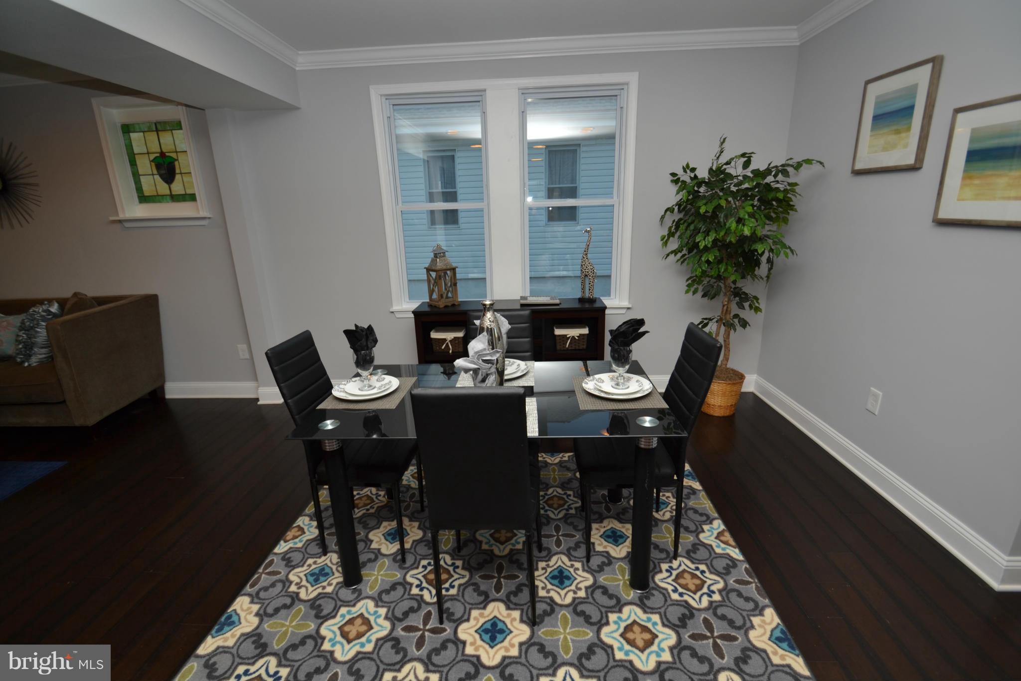 3810 Ridgecroft Road Baltimore, MD 21206 - Photo 7 of 30 a dining room with furniture and window