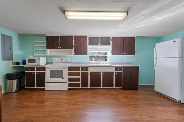 a kitchen with stainless steel appliances a stove and a refrigerator