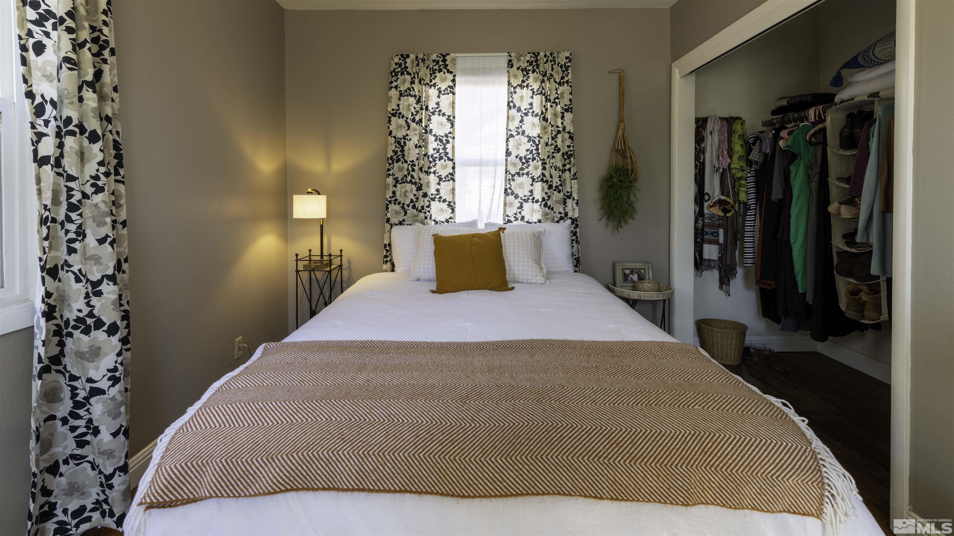 718 Balzar Circle Reno, NV 89502 - Photo 15 of 20 a bedroom with a bed and a window