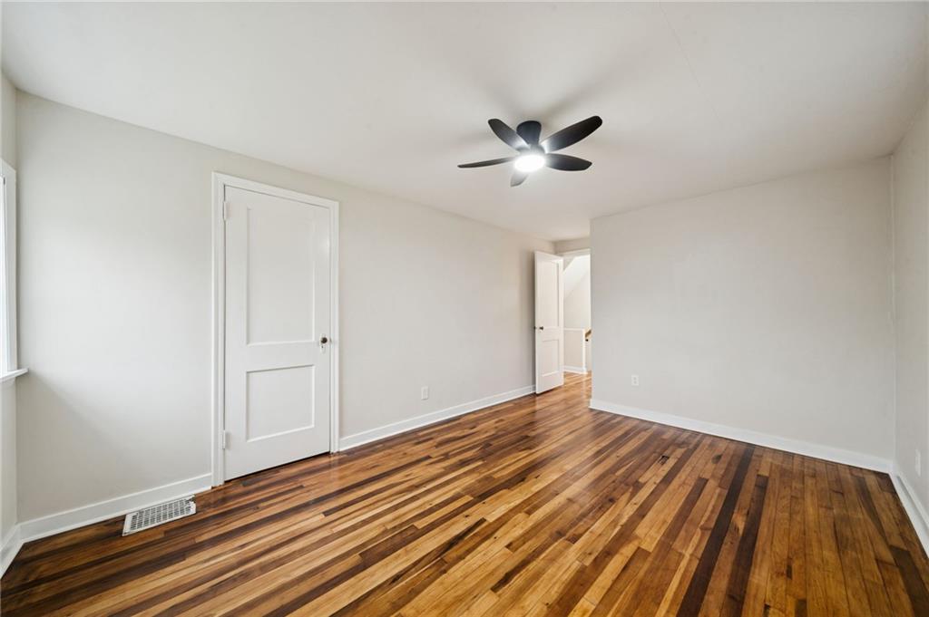 601 Milltown Road New Kensington, PA 15068 - Photo 26 of 36 a view of empty room with wooden floor