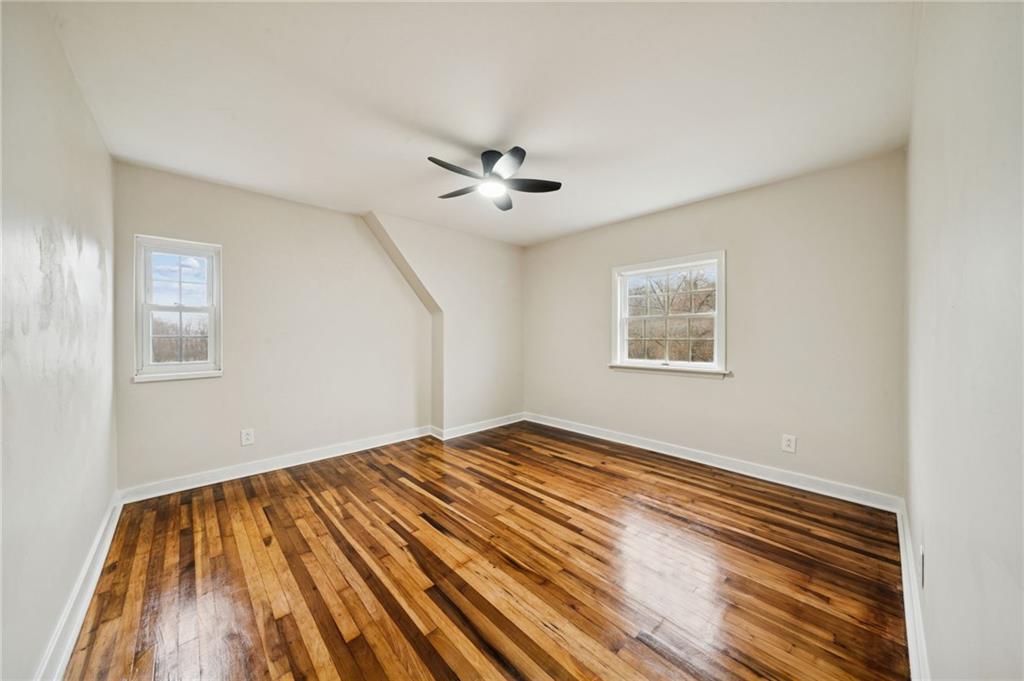 601 Milltown Road New Kensington, PA 15068 - Photo 27 of 36 a view of empty room with wooden floor and fan