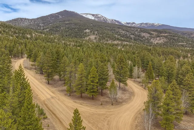 a view of a mountain from a balcony