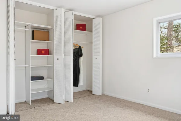 a view of livingroom with hardwood floor and closet