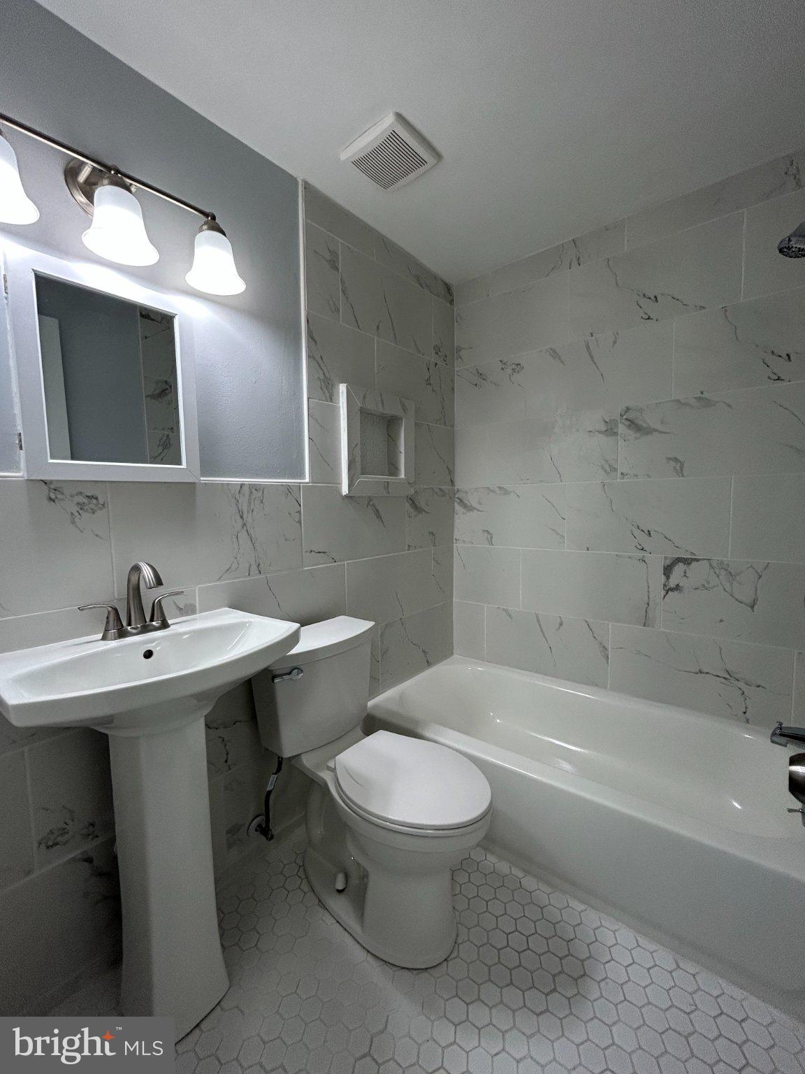 308 Burmont Road Drexel Hill, PA 19026 - Photo 16 of 20 Modern elegance in a serene bathroom.