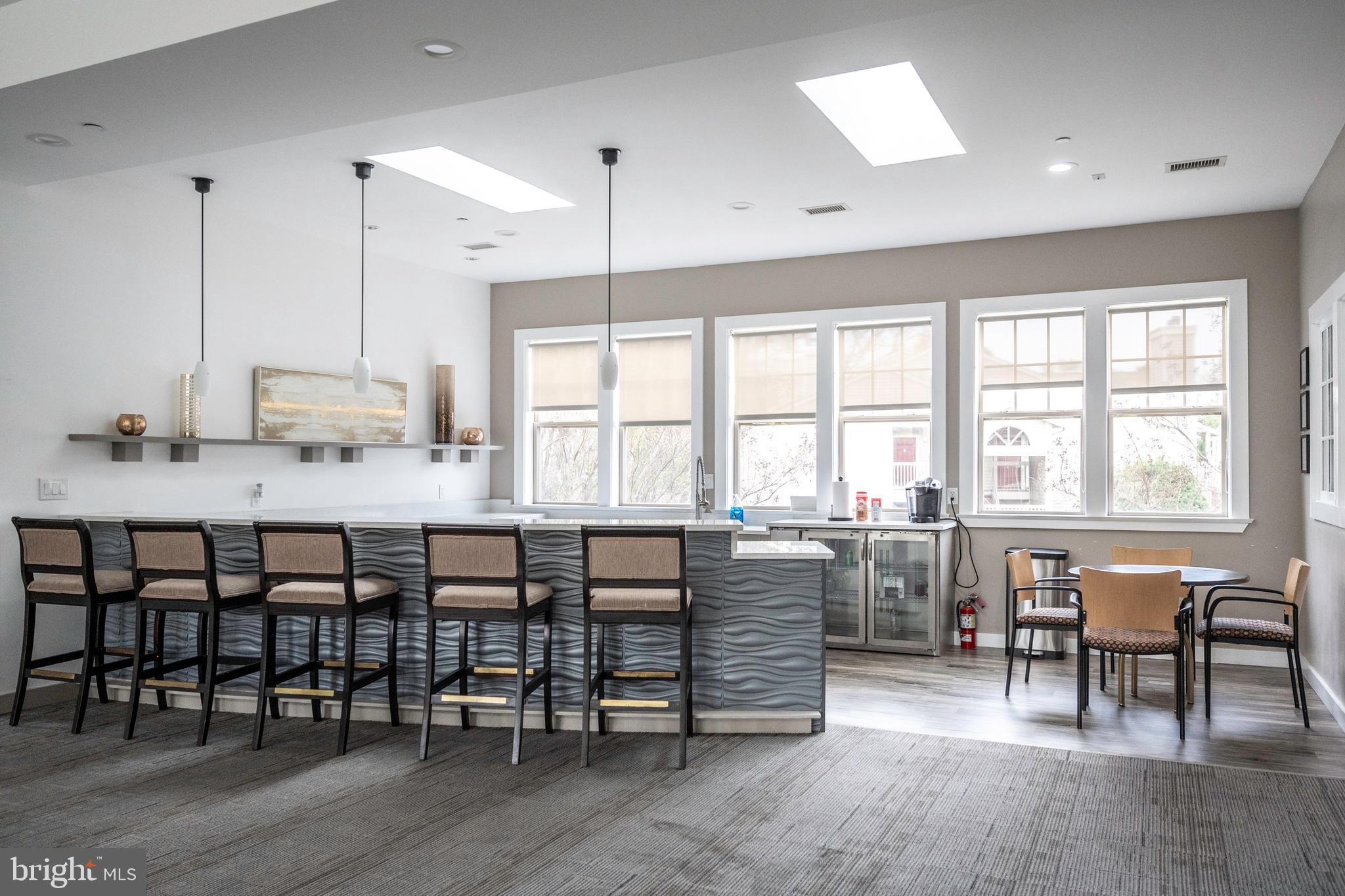 1725 Ascot Way, Unit 1725I Reston, VA 20190 - Photo 35 of 48 COMMUNITY CENTER GREAT ROOM 4