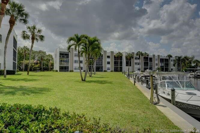 1950 Southwest Palm City Road, Unit 3209 Stuart, FL 34994 - Photo 37 of 64 Lush grounds.