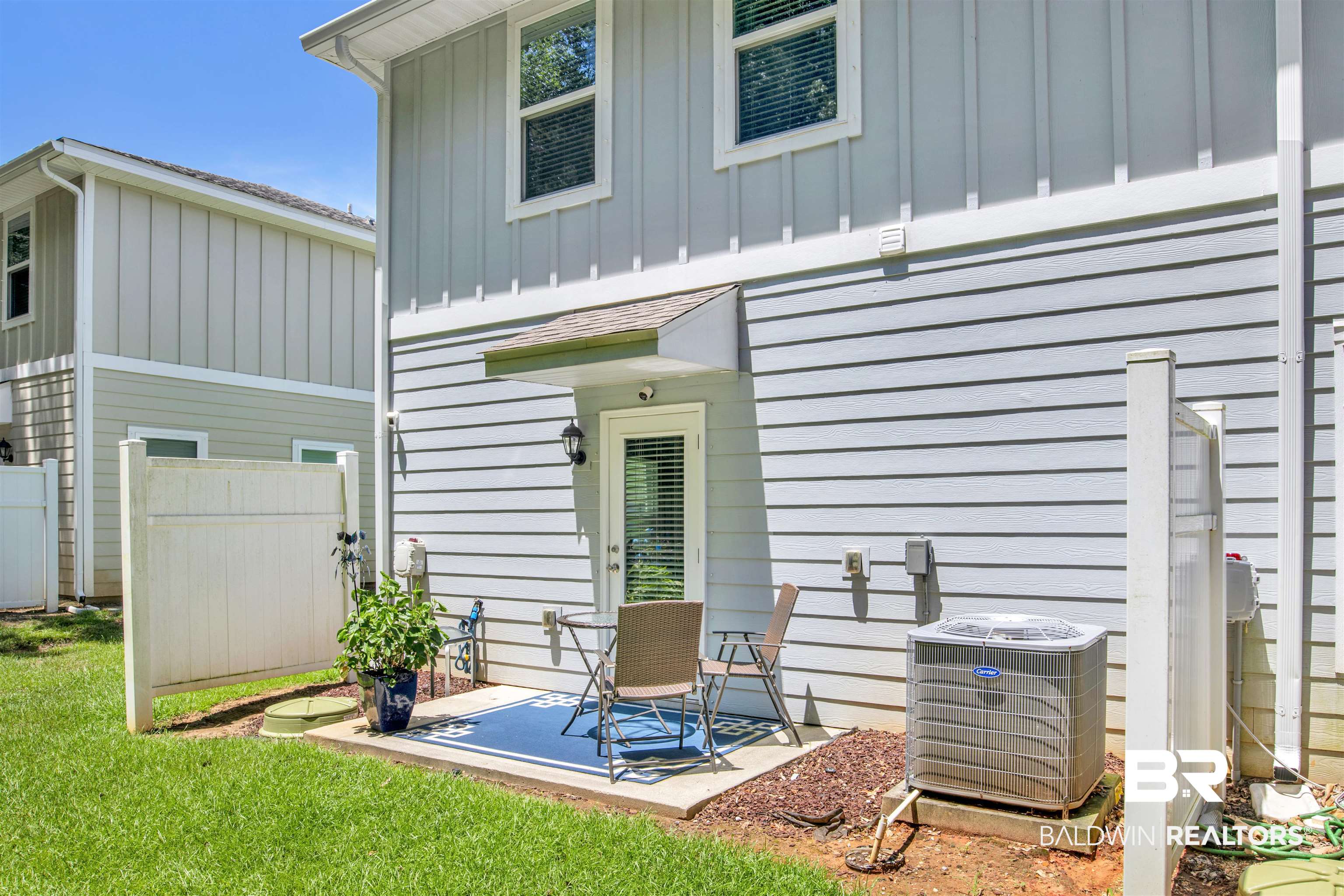 25806 Pollard Road, Unit 20 Daphne, AL 36526 - Photo 24 of 29 Back of house featuring cooling unit