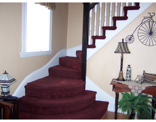 41 Baker Road Everett, MA 02149 - Photo 2 of 9 a view of entryway and hall with wooden floor