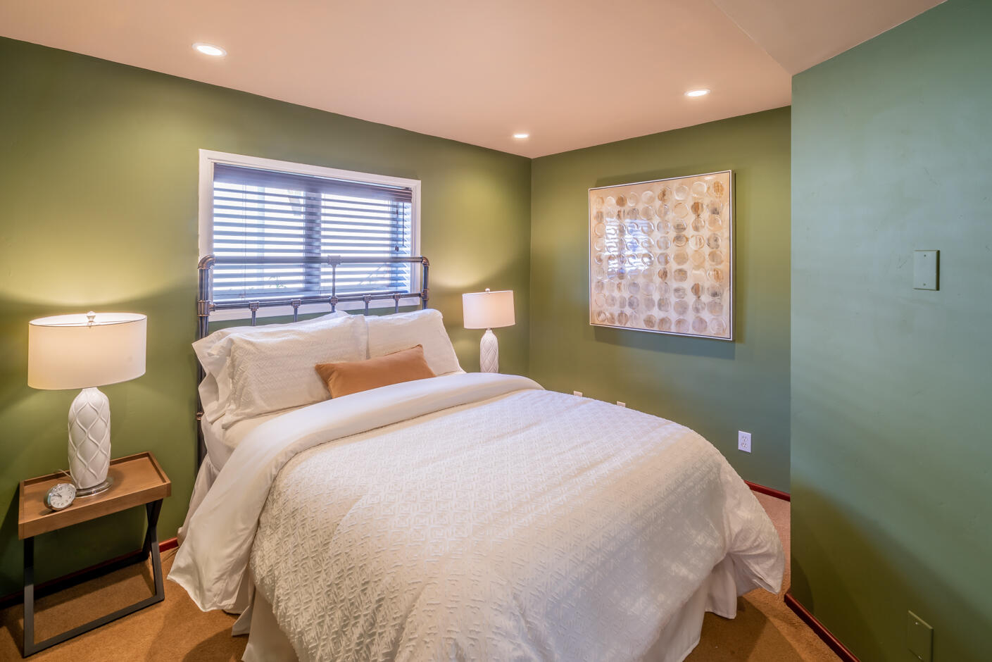 511 Drexel Drive Santa Barbara, CA 93103 - Photo 22 of 27 a bed sitting in a bedroom next to a lamp