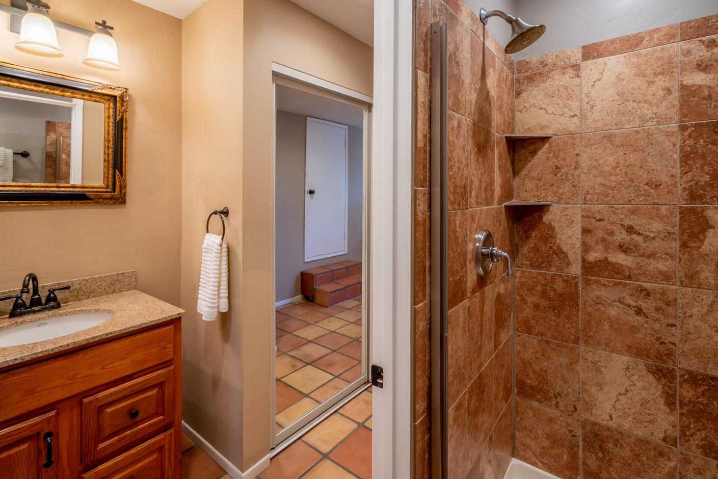 511 Drexel Drive Santa Barbara, CA 93103 - Photo 23 of 27 a bathroom with a sink and a mirror