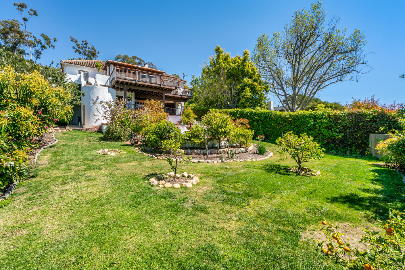511 Drexel Drive Santa Barbara, CA 93103 - Photo 26 of 27 a view of a house with a big yard plants and large trees