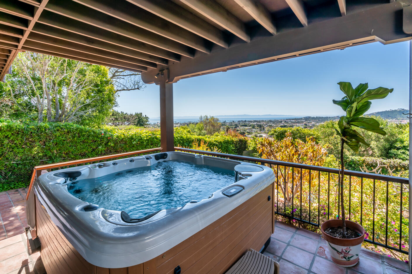 511 Drexel Drive Santa Barbara, CA 93103 - Photo 4 of 27 a view of roof deck with dining table and chairs in a patio