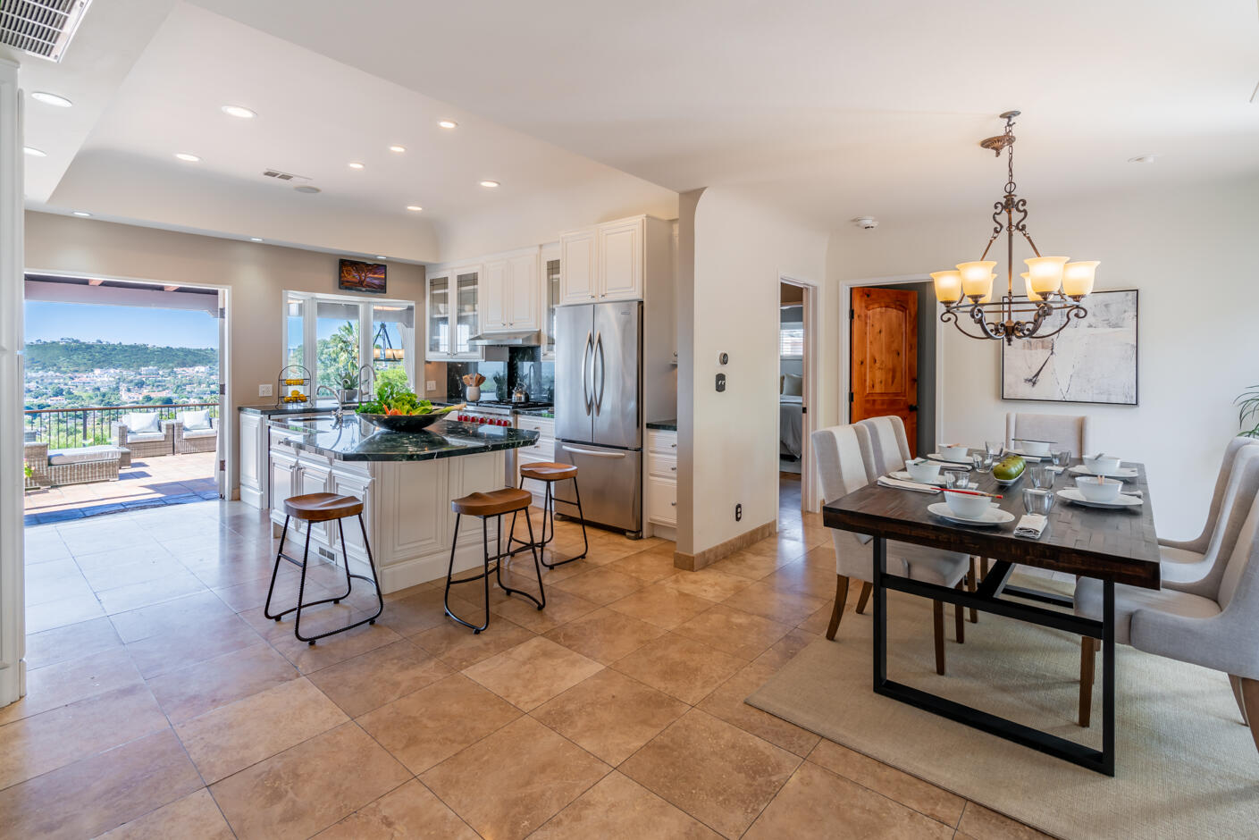 511 Drexel Drive Santa Barbara, CA 93103 - Photo 5 of 27 a view of a dining room and livingroom with furniture wooden floor a chandelier
