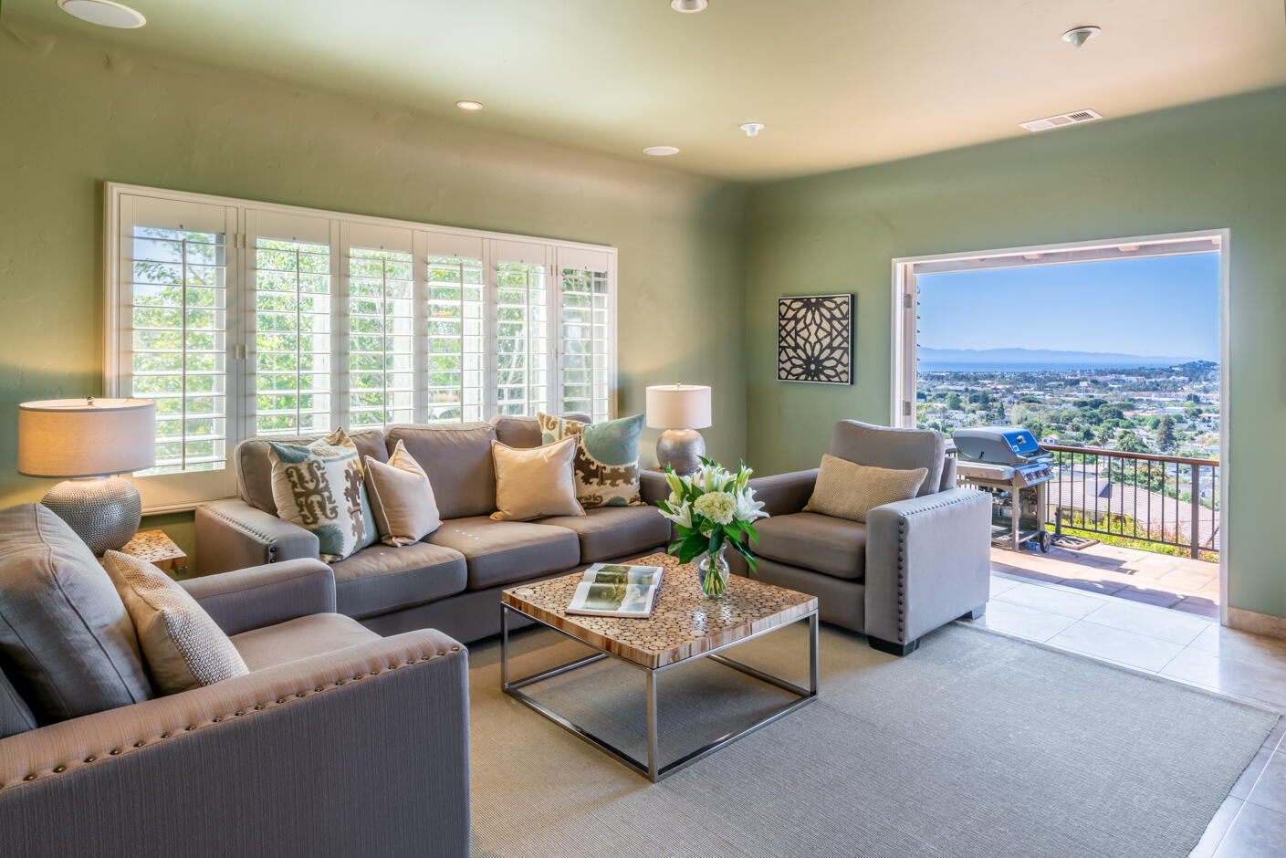 511 Drexel Drive Santa Barbara, CA 93103 - Photo 7 of 27 a living room with furniture and a floor to ceiling window